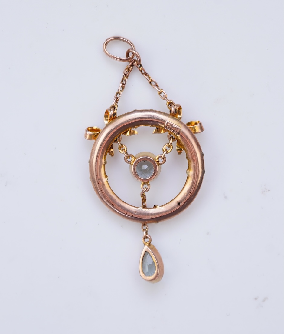 An Edwardian seed pearl and aquamarine pendant, circa 1910